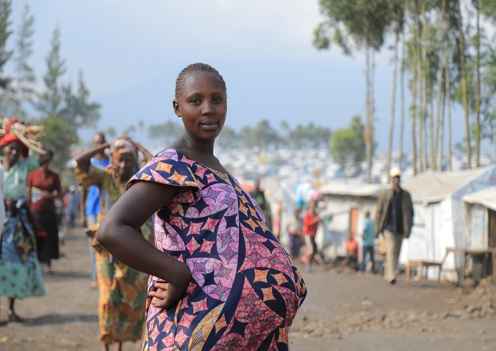 Photo d’une femme enceinte après consultation prénatale dans le site de déplacés de Rusayo 1