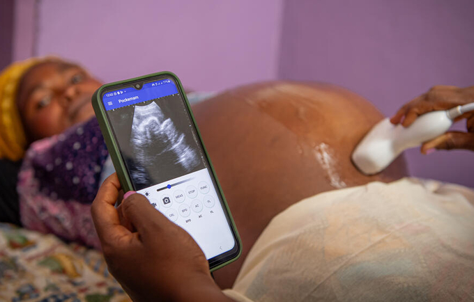 Anitha Bosco, 35, receives an ultrasound scan from UNFPA midwife Kavira Kamate at the Kanyaruchinya health centre in North Kivu.