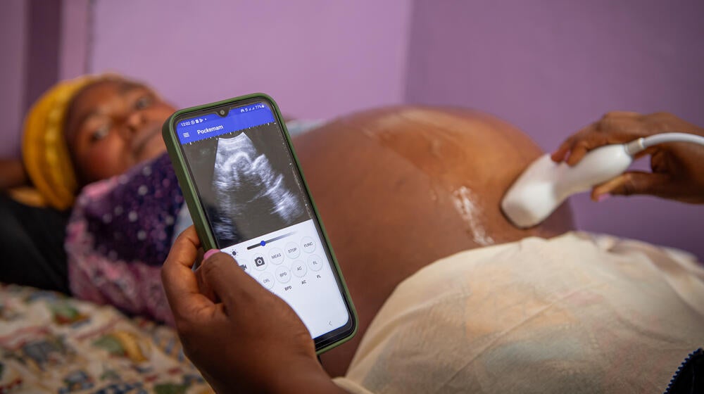 Anitha Bosco, 35, receives an ultrasound scan from UNFPA midwife Kavira Kamate at the Kanyaruchinya health centre in North Kivu.