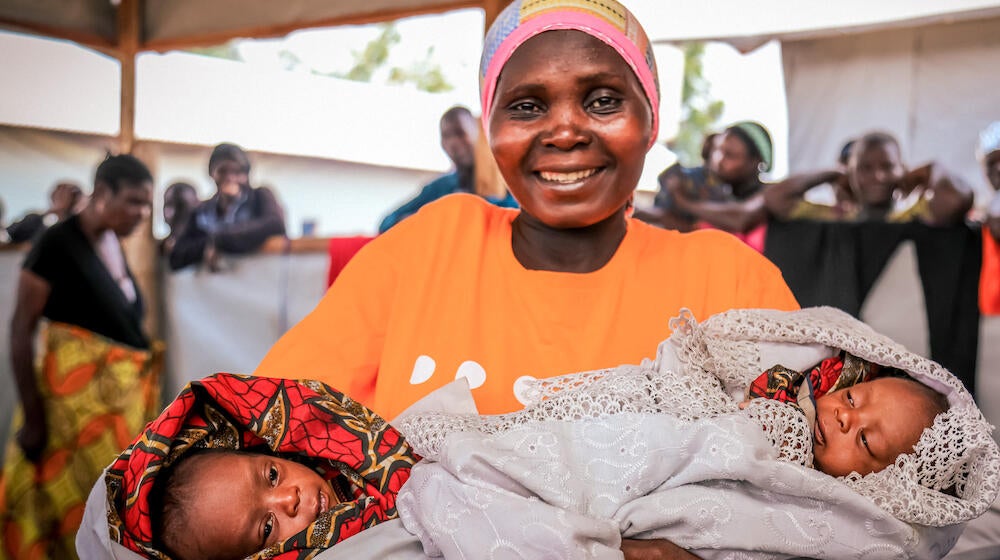 Rebecca Wimana with her newborn twins Mwayonimana (left) and Issaka Kwiseka (right), who were born at Tata Mwami Rugabo II.
