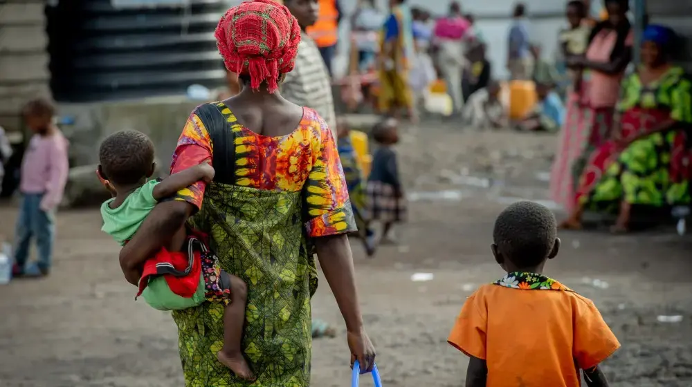 Vendeuse de beignets sur le site des déplacées internes du Nyiragongo grâce à l’appui financier de UNFPA